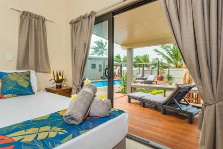 Turangi Lagoon Villas - view-of-deck-from-bedroom
