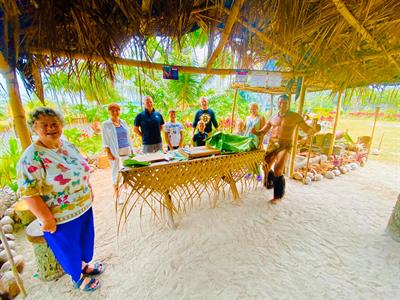 Tumutoa Tours - Food Preparation in the umu hut